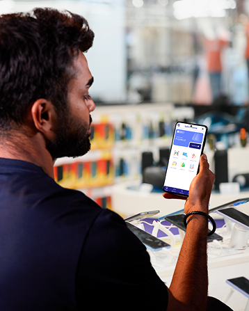 Customer using CreditBook in mobile shop